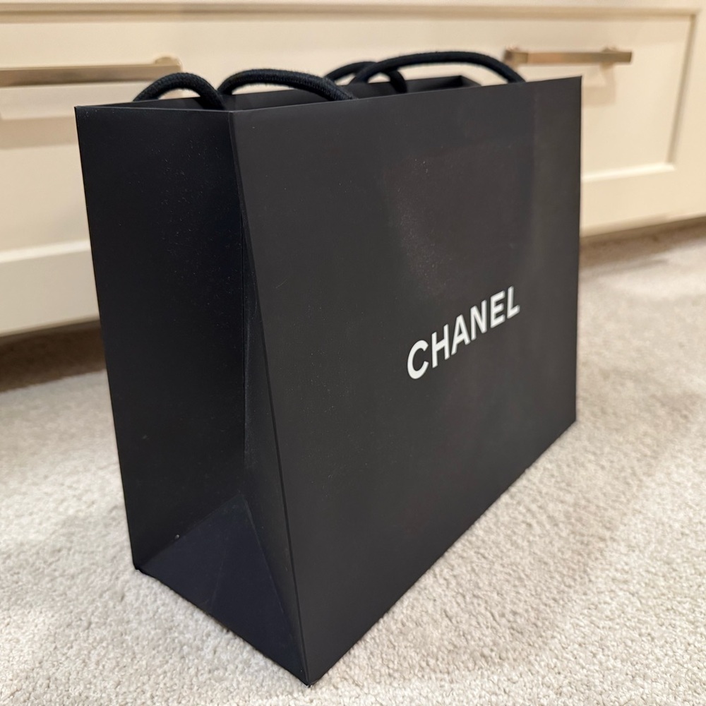 CHANEL Black Paper Bag with White Floral Detail - Picture 3 of 6